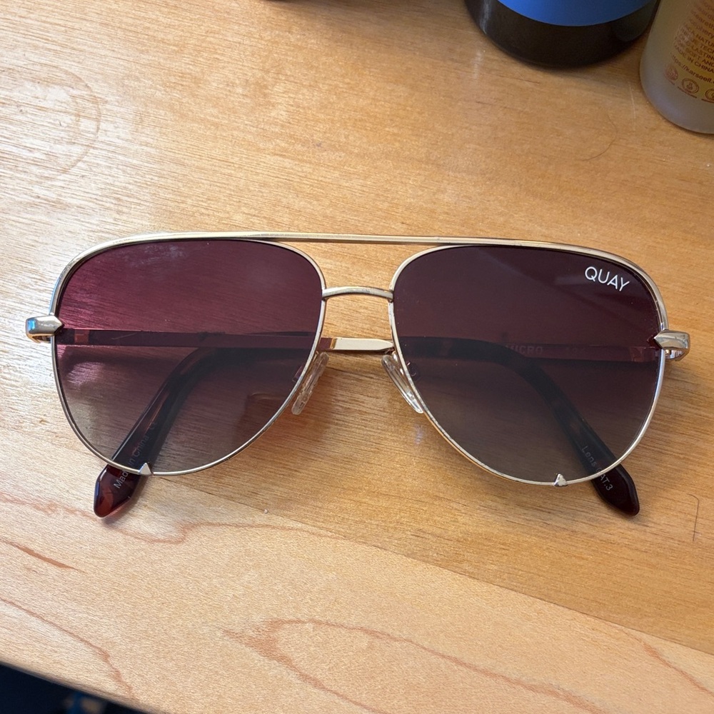Quay Australia Gold Frame Sunglasses with Burgundy Gradient Lenses